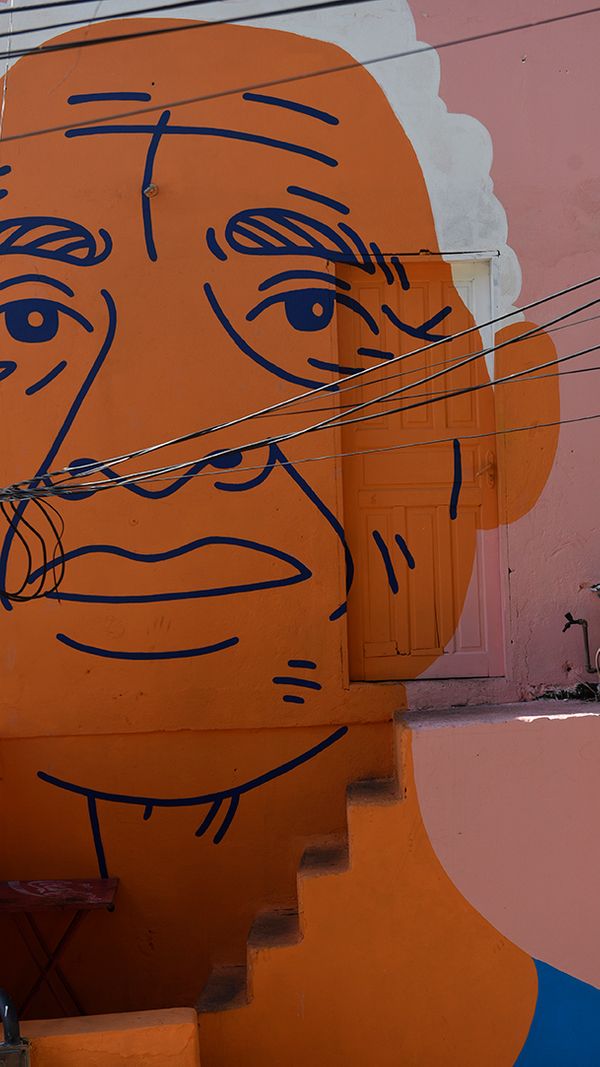 Projeto Cidade Quintal pinta casas, escola e comércios na Ilha das Caieiras  por Vitor Jubini