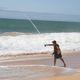 Pessoas curtindo o dia de sol na praia de Coqueiral de Itaparica