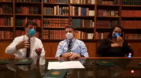 Bolsonaro participou de transmissão pela rede social ao lado de ministro da Saúde para falar sobre coronavírus. Crédito: Reprodução de vídeo