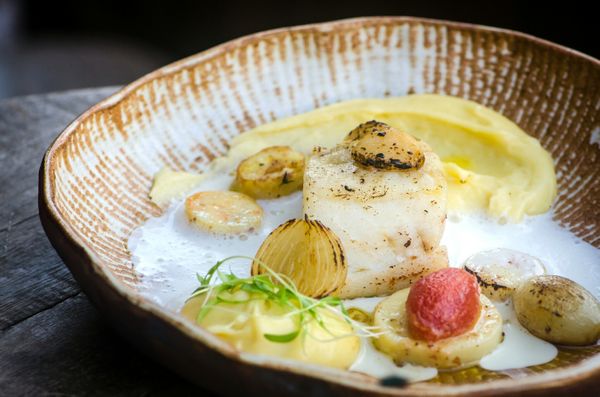 Bacalhau, palmito, tomate confit e creme de natas da chef Kamila Zamprogno, do restaurante Cafe Haus