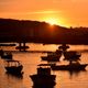 Imagem - Fotojornalismo: o entardecer visto da Ponte de Camburi, em Vitória