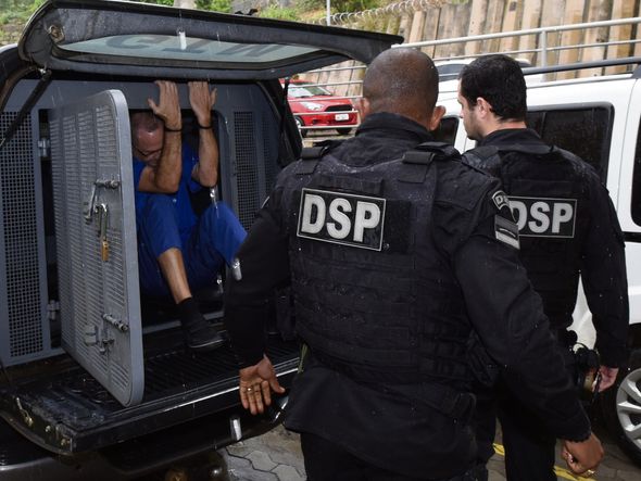 O ex-policial civil Hilário Frasson  chega escoltado para a audiência da guarda das filhas, no Centro Avançado dos Juizados da Infância e da Juventude de Vitória  por Carlos Alberto Silva