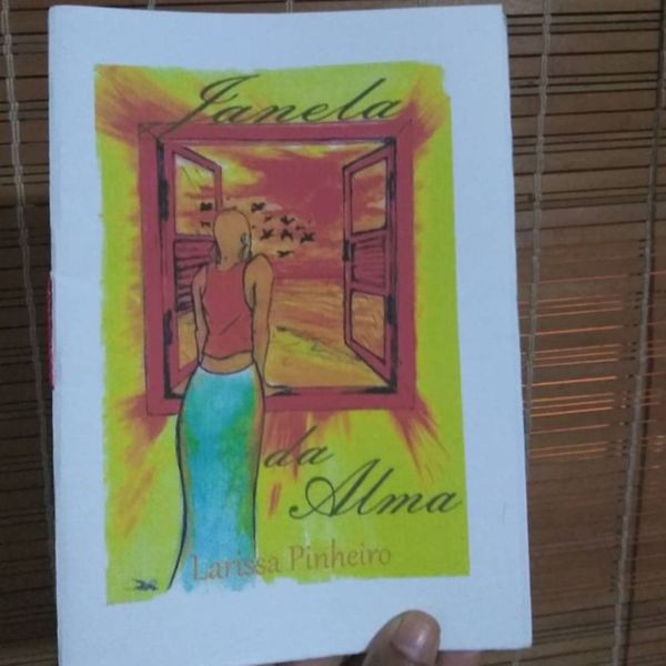 O livro de poesias Janela da Alma