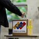 Imagem - Ausência da oposição e alta abstenção marcam eleição legislativa na Venezuela