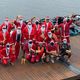Imagem - Papai Noel entrega bombons de jet ski em bairros de Vitória