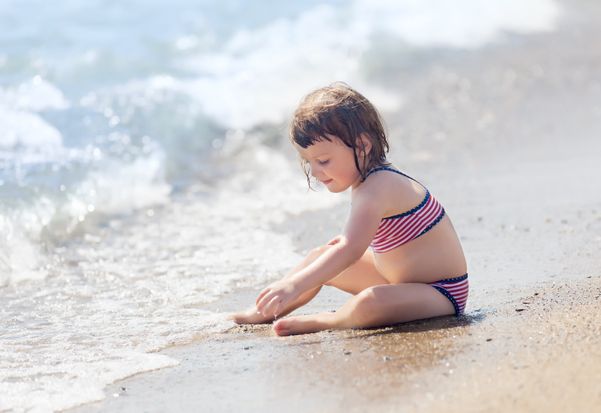 Criança na praia