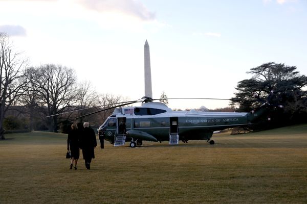 U.S. President Donald Trump and first lady Melania Trump depart the White House to board Marine One ahead of the inauguration of president-elect Joe Biden, in Washington, U.S., January 20, 2021. REUTERS/Leah Millis ORG XMIT: GDN