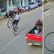 Imagem - Ciclista empina bicicleta, cai no meio da rua e tombo viraliza no ES