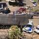 Imagem - Caminhão tomba sobre viatura e derruba árvore em Dores do Rio Preto