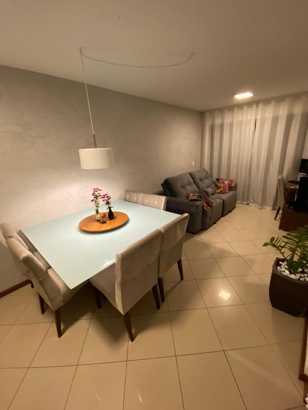  O acabamento cimento queimado aplicado na parede da sala do Hiago Comarela  por Arquivo Pessoal de Hiago Comarela 