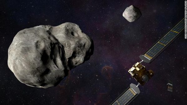 Ilustração mostra sistema de asteroides ao lado da sonda da missão Dart