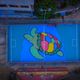 Artista pinta tartaruga gigante em quadra de Jesus de Nazareth