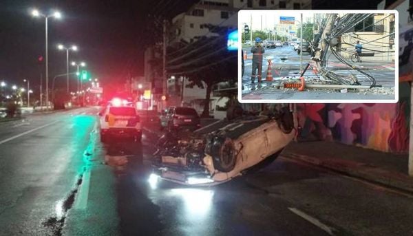 Carro destrói poste e capota na Avenida Dante Michelini, em Vitória