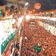 27/11/1994 - Foliões pulando carnaval em Camburi