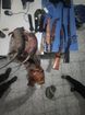 Armas, materiais de caças e dois tatus abatidos foram apreendidos pela polícia(Divulgação/Polícia Militar Ambiental)