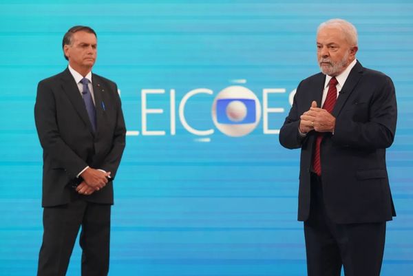 Candidatos Jair Bolsonaro e Luiz Inácio Lula da Silva durante debate eleitoral na TV Globo