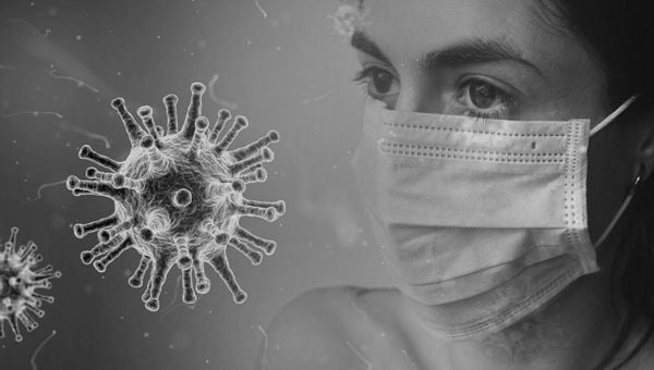 Mulher de máscara para se proteger do novo coronavírus