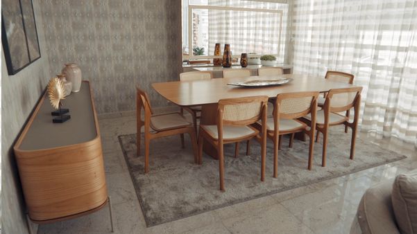 Ambiente decorado com itens Conquista: conforto e requinte