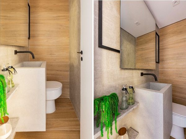 Lavabo com cuba de apoio, produzida com cimento queimado. Piso e paredes revestidos com vinílico.
