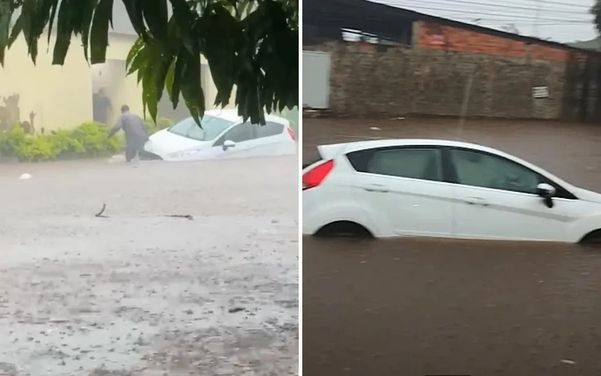 Família é resgatada em carro após ficar presa durante temporal, em Goiânia