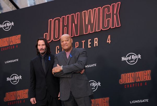 Keanu Reeves e Laurence Fishburne na premiere do filme 