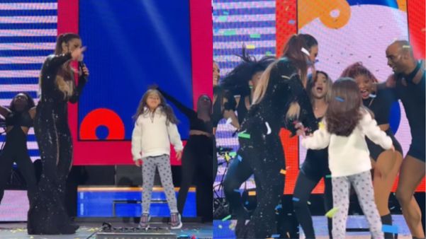 A pequena Marina se divertindo no palco em show da mãe, Ivete Sangalo