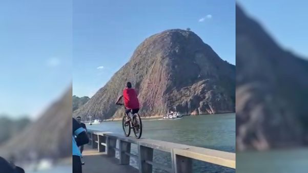 Ciclista viraliza ao pedalar em cima da mureta da Avenida Beira-Mar