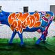 1ª parte do grafite feito pelo capixaba Starley, responsável por pintar a vaca que abre as inscrições para a exposição CowParade Vitória/Vila Velha