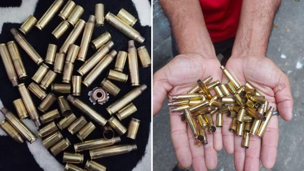 Cápsulas recolhidas por moradores após ataque em Santos Dumont, Vitória
