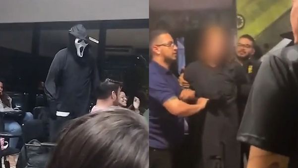 Imagens que circulam nas redes sociais mostram o homem fantasiado com roupas pretas e usando uma máscara