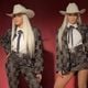  Beyoncé com estética country em looks usados no Grammy 2024