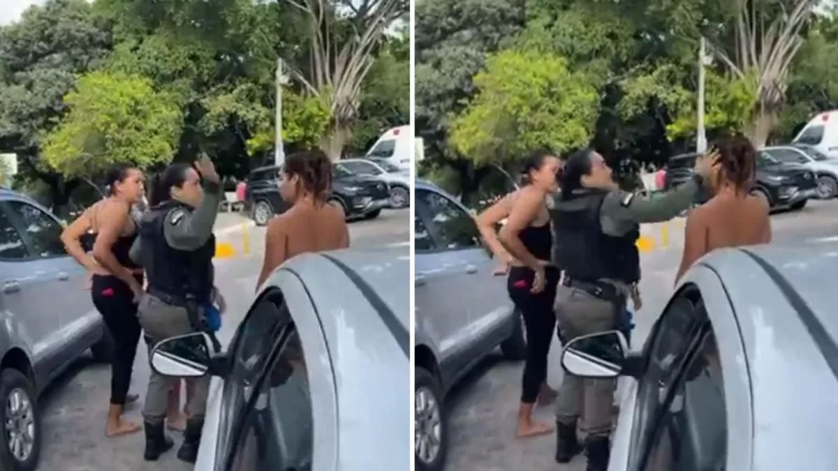 Vídeo que circula nas redes sociais mostram a policial dando um tapa no rosto de uma mãe suspeita de agredir a filha