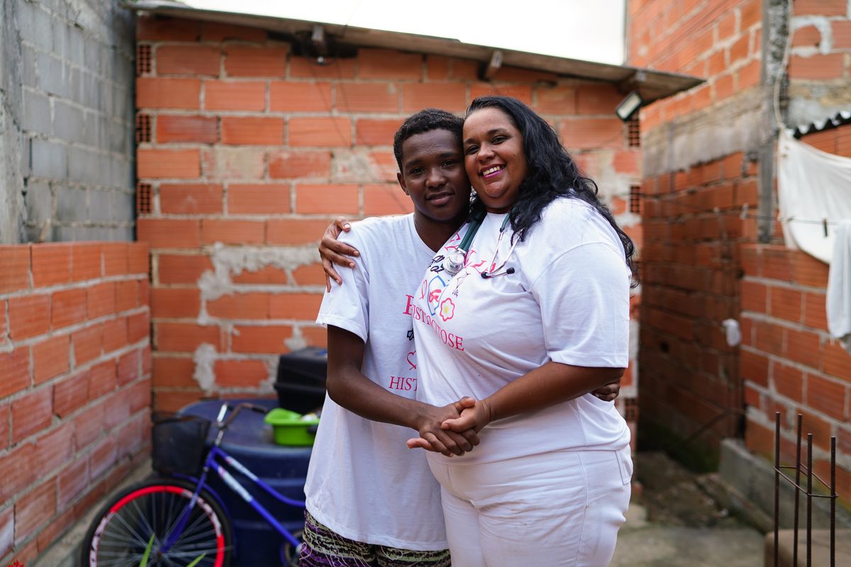 Keules Cristina dos Santos e seu filho Italo Adriano dos Santos Cardoso Fernandes por Vitor Jubini