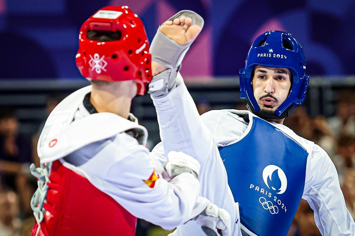 O atleta brasileiro Edival Pontes, o Netinho (azul), em duelo contra o espanhol Javier Pérez Polo. O brasileiro garantiu a medalha de bronze ao ganhar este confronto