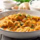 Frango ao curry com leite de coco (Imagem: nesavinov | Shutterstock)