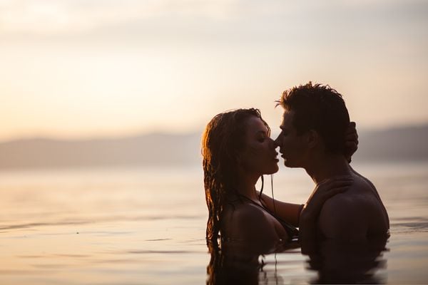 Casal na praia / Sexo