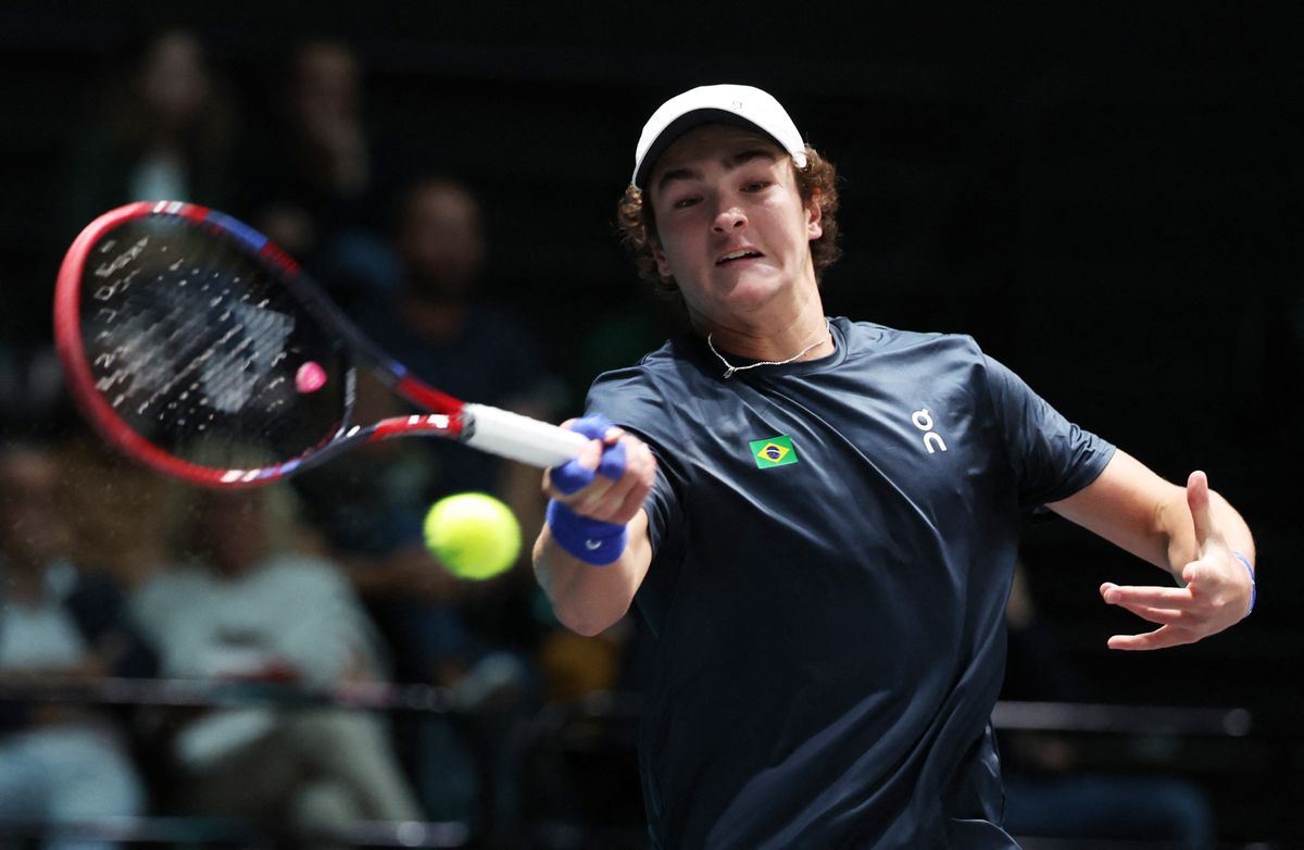 Tennis - Davis Cup - Group A - Belgium v Brazil - Unipol Arena, Bologna, Italy - September 14, 2024     Brazil's Joao Fonseca in action during his singles match against Belgium's Raphael Collignon REUTERS/Claudia Greco