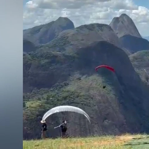 Imagem - Piloto de parapente fica pendurado em árvore após girar no ar e cair no ES