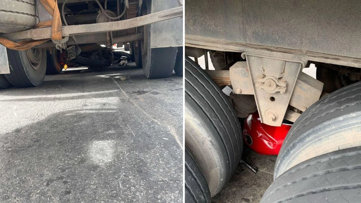 Moto ficou presa embaixo da carreta, motociclista se feriu levemente