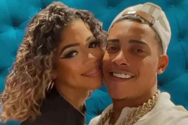 Viviane Noronha ao lado de MC Poze do Rodo