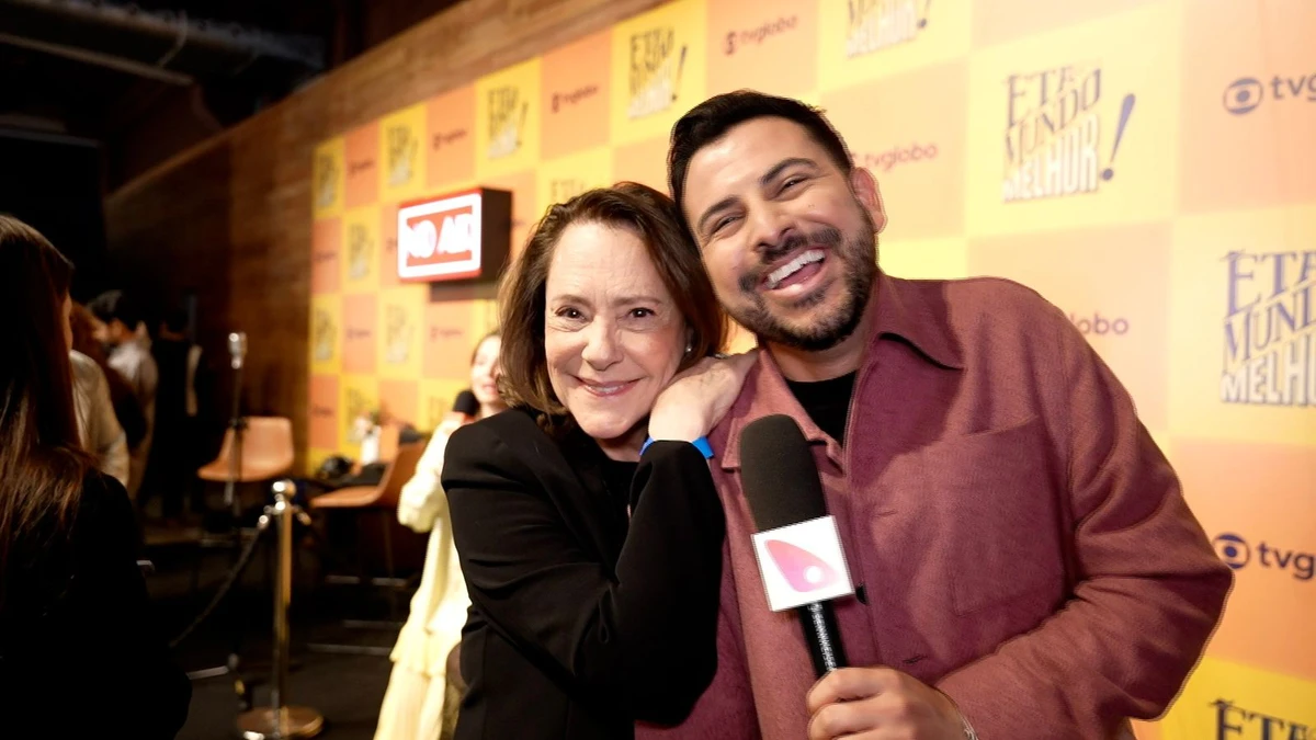 O apresentador Will Loyla com Elizabeth Savalla