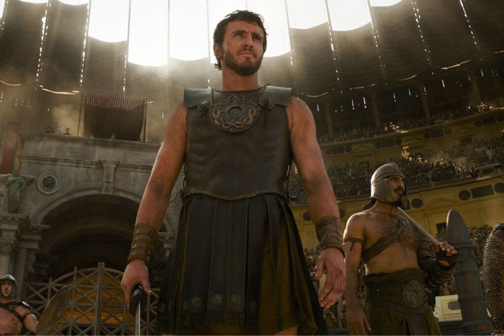 Em “Gladiador 2”, Lucius precisa derrubar os imperadores e corruptos de Roma para garantir o seu futuro (Imagem: Reprodução digital | Paramount Pictures e DreamWorks Pictures)