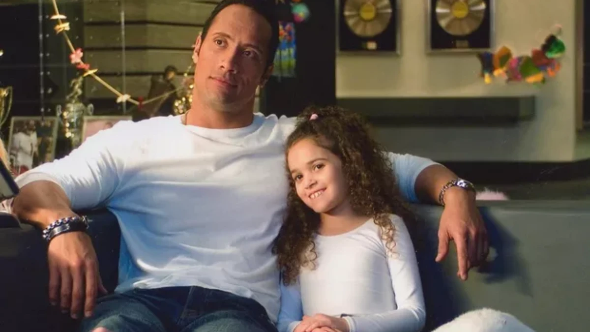 Dwayne Johnson e Madison Pettis no filme 