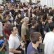 Multidão em frente ao centro universitário Faesa no primeiro dia do Enem 2025.
