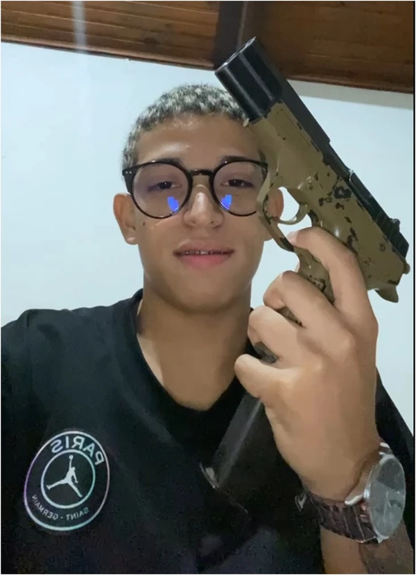 Investigados portando armas de fogo por Divulgação | Polícia Civil