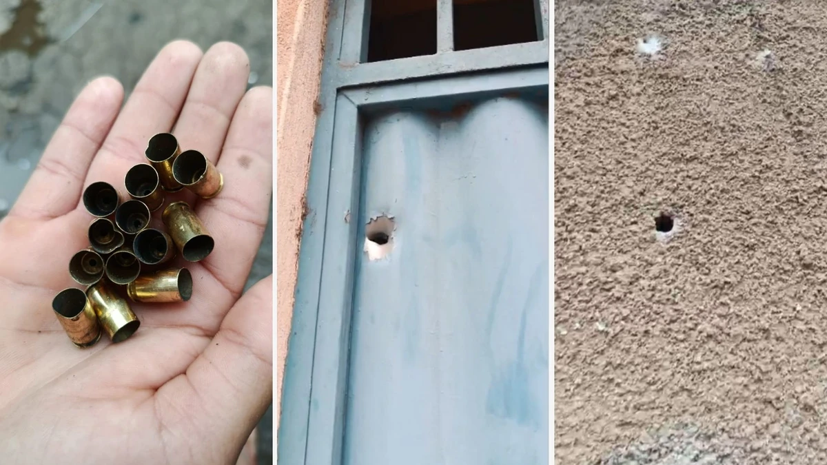 Muro e portão ficaram com as marcas dos tiros e cápsulas foram recolhidas da rua