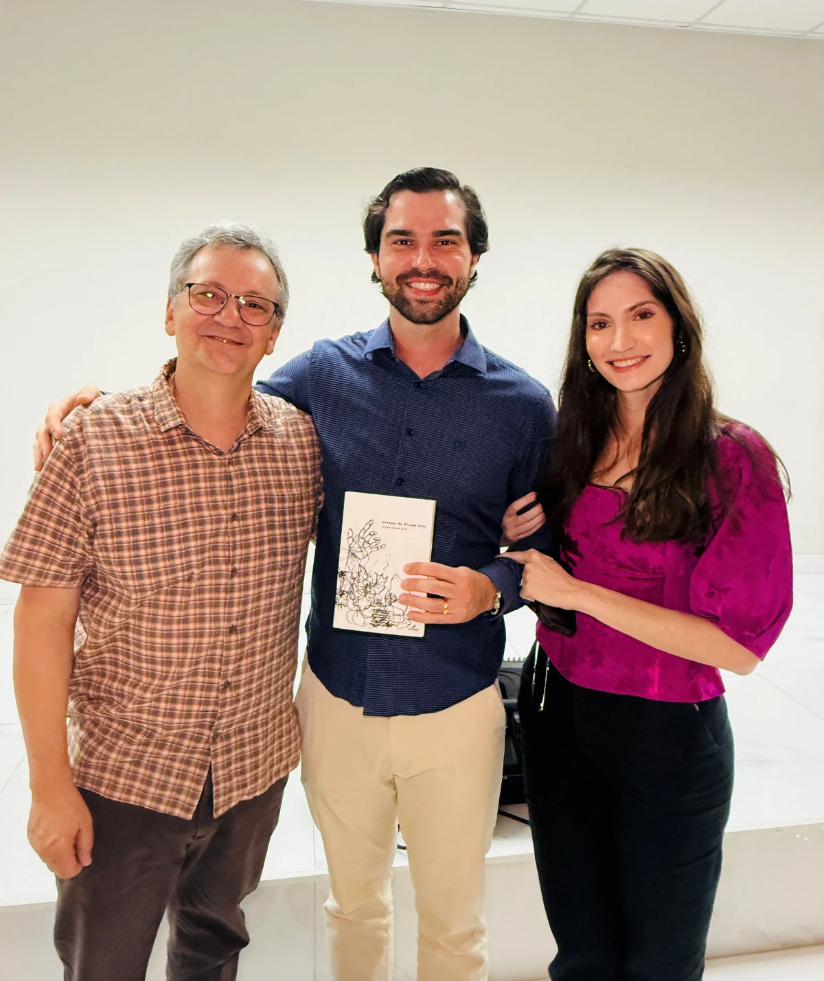 O médico e escritor Jorge Elias Neto, Gabriel Binda e Elisa Bicalho